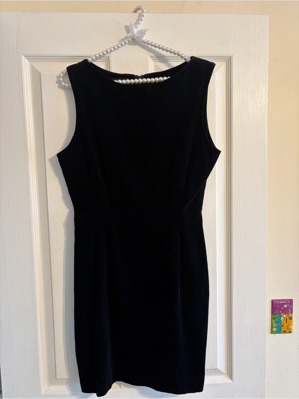 Classic Black Sleeveless Sheath Dress